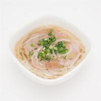 Raw Beef Pho · Rare beef eye round thinly sliced. Comes with beansprout, scallion, onion, black pepper, lim...