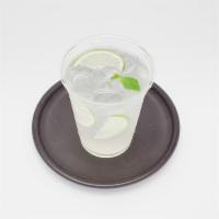 Fresh Lime Lemonade · Fresh squeezed lime juice lemonade with mint leaves.