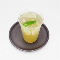 Green Tea Lemonade · Fresh squeezed lime juice lemonade with green tea base and mint leaves