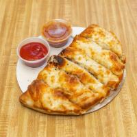 Steak and  Cheese Calzone · 8 oz. (small) or 16 oz. (large) of shaved steak and American cheese.