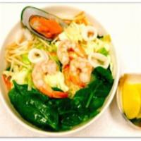 Nagasaki Jjambbong · Pork and chicken soup base, ramen noodles, shrimp, calamari, mussels, garlic and vegetables.