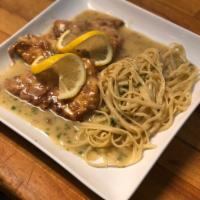 Chicken Francese · Chicken cutlets sauteed with butter, wine and lemon.
