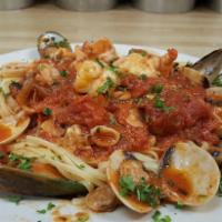 Frutti di Mare · A combination of calamari, mussels, shrimp and clams sauteed in homemade marinara sauce serv...
