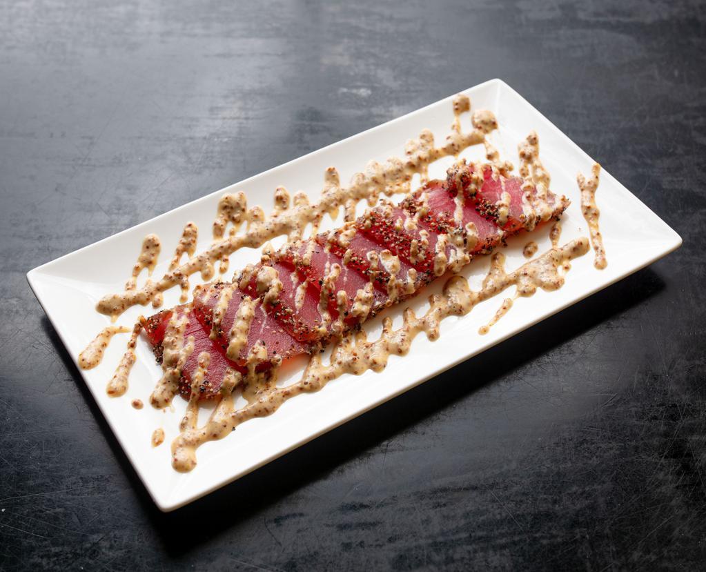 Black Pepper Tuna · Seared sashimi tuna coated with black pepper, served with mustard sauce.Packed separately with dry ice, always cool & fresh.