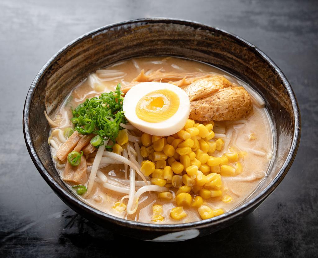 V1. Kome Miso Ramen · Standard rich flavor miso base soup. Topped with bean sprouts, cabbage, scallion, corn, fried potato, menma as bamboo shoot, and miso egg.