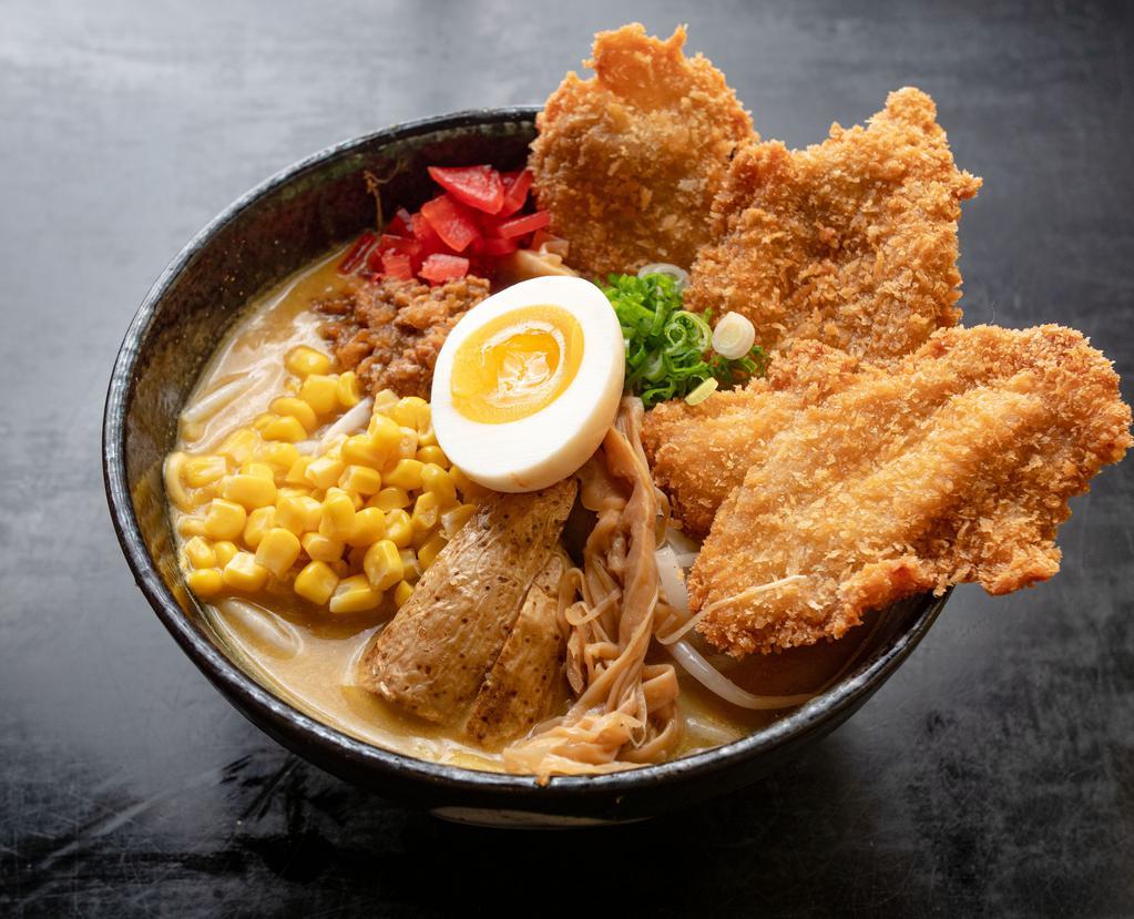 Miso Curry Chicken Katsu Ramen Special · Rich curry-flavored miso soup base. Topped with 3 pieces crispy chicken cutlet, ground pork, bean sprouts, cabbage, scallion, corn, fried potato, menma as bamboo shoot, fukujinzuke as pickled daikon radish, and miso egg.
