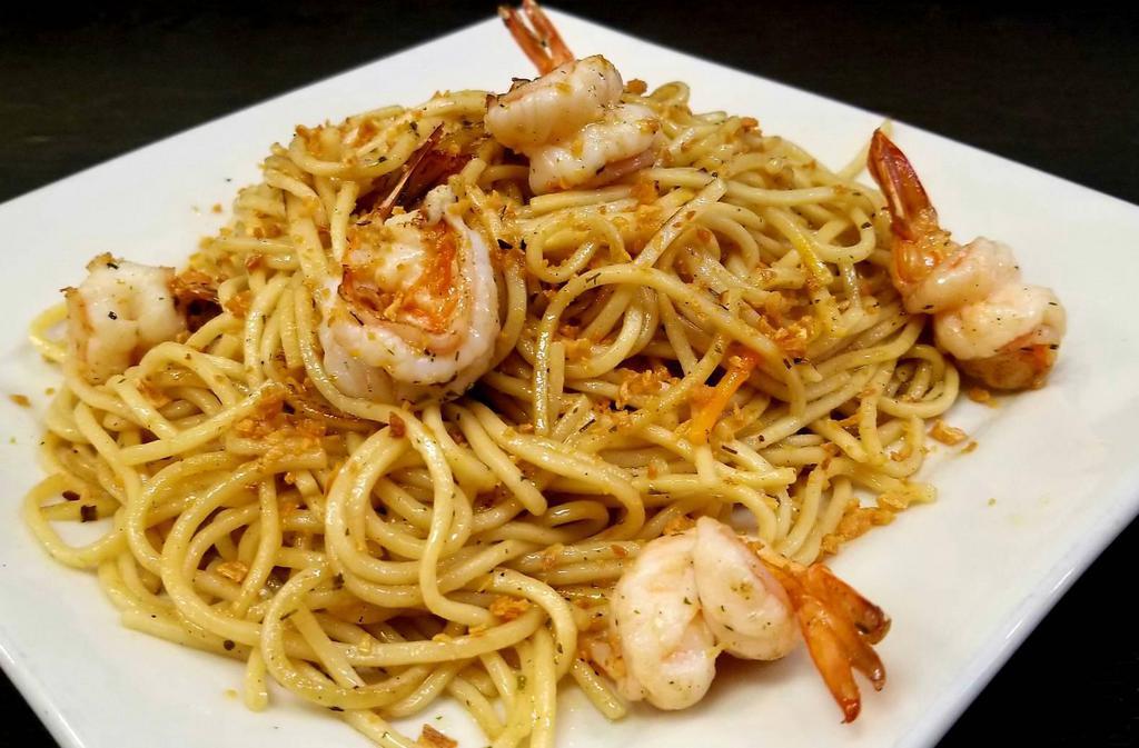 67. Garlic Noodles Shrimps · Stir-fried Spaghetti noodle and Shrimps in garlic butter sauce.