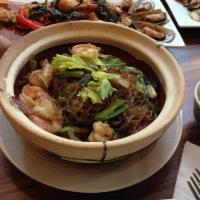 Goong-Ob-Woon-Sen · Shrimp potted with vermicelli noodle. An array of succulent jumbo shrimp on top of napa and ...