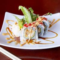 S1. Spider Roll 40% off  · 40% off the regular price! 
Soft shell crab, cucumber, kaiware, green leaf and tobiko, top: ...