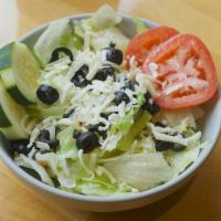 House Dinner Salad · Tomatoes, cucumbers, black olives, mozzarella cheese, mix lettuce and your choice of dressin...