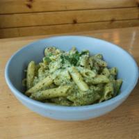 Penne Chicken Pesto · Penne pasta in creamy garlic and pesto sauce served with chicken.