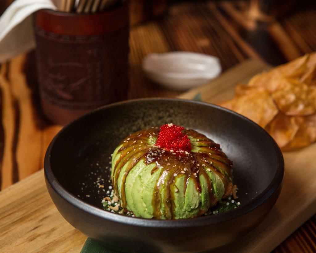 The Bomb · Choice of spicy tuna, or spicy salmon wrapped in avocado served with homemade sweet potato chips.