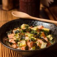 Sake and Ikura Donburi · Seared dice-cut salmon, tamago and ikura over sushi rice.