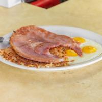 Eggs N Pork Chops  · Served with hash browns and toast.