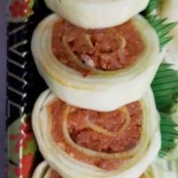 Naruto (Spicy Tuna) · Spicy tuna wrapped with cucumber