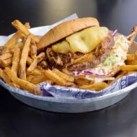 Sweet Caroline · 1 beef patty, BBQ pulled pork, smoked Gouda, adobe q sauce with sweet and spicy slaw.