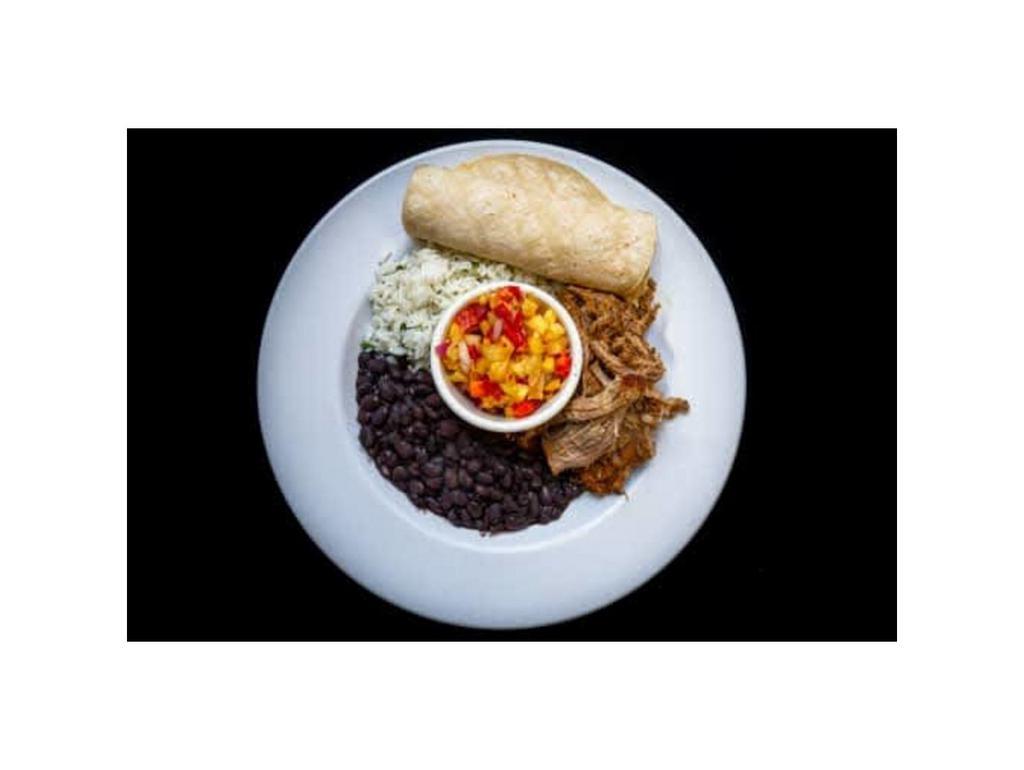 Yucatan Style Slow Roasted Pork Bowl · Rice, black beans, pineapple mango salsa, and tortillas.
