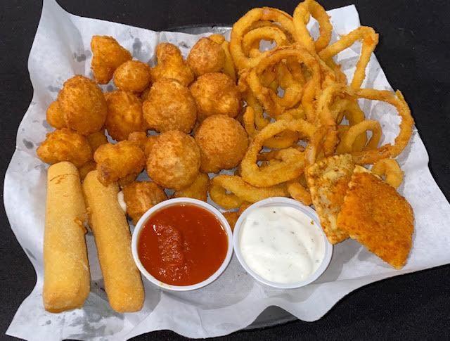 Combo Basket · Onion Rings, 2 Cheesesticks, 2 Toasted Ravioli, Fried Mushrooms
and Fried Cauliflower, No Substitutions. Served with Ranch Dressing
and Spaghetti Sauce
