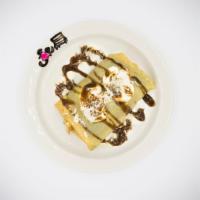 Mushroom and Turkey Crepe · Grilled mushroom, turkey, provolone and ricotta. Topped with honey balsamic sauce. Served wi...