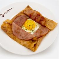 Hameggan Cheese Crepe · Sunny side-up egg, grilled ham and Swiss cheese. Served with side of garden salad.