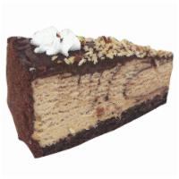 Mississippi Mudd · Mocha and chocolate ice cream marbled into a chocolate cookie crust. Topped with caramel fud...