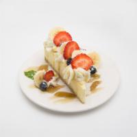 Fruit Cheese Cake · New york cheesecake with strawberry, banana, blueberry and whipped cream with gourmet maple ...