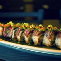 Cooked Steak and Shrimp Creation Roll · Shrimp tempura, cucumber, topped with seared rib-eye, green onion, jalapenos and spicy ponzu...