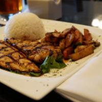 Chicken Teriyaki · 8 oz. marinated split chicken breast grilled and topped with teriyaki sauce. Served with ste...