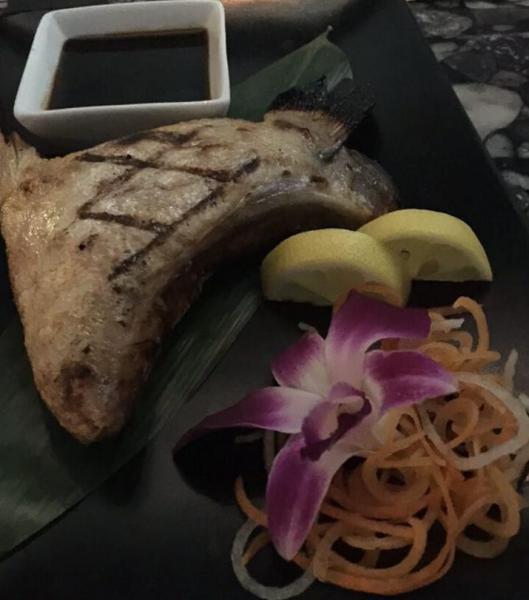 Hamachi Kama · Grilled yellowtail cheek served with teriyaki sauce.