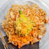 Sesame Ginger Chicken · Chicken, sweet onions, and shredded carrots tossed in sesame ginger. Topped with avocado, ca...