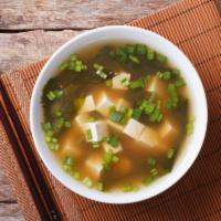 Housemade Miso Soup · A traditional Japanese soup with silken tofu, miso paste, dashi granules and green onion. 