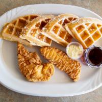 Chicken and Waffles · 1 whole malted waffle with 2 breaded chicken tenderloins topped with powdered sugar.