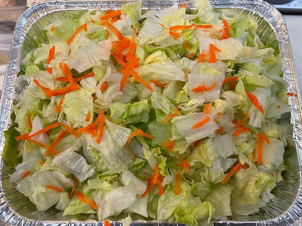 Tray of Salad with bottle salad dressing  · 
