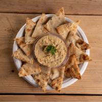 Hummus ＆ Pita · Lebanese family recipe. Comes with fluffy oven finished pita bread for dipping. Hummus conta...