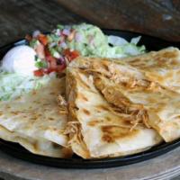 Chicken Quesadilla · Flour tortilla loaded with Monterey Jack cheese & tender chicken breast. Served with pico de...