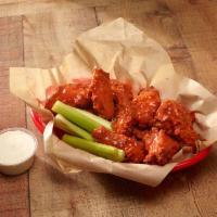 Daddy's Wings · Full pound of breaded wings tossed with buffalo or BBQ sauce served with ranch or blue chees...