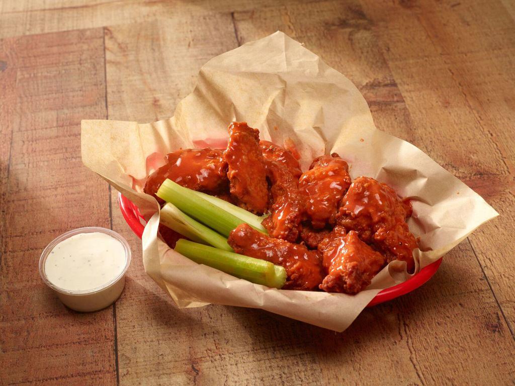 Daddy's Wings · Full pound of breaded wings tossed with buffalo or BBQ sauce served with ranch or blue cheese dressing.