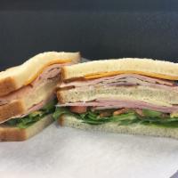 4. Oasis Club · Turkey, ham, bacon, mayo, lettuce, tomato, avocado, Swiss and cheddar cheese on 3 slices of ...