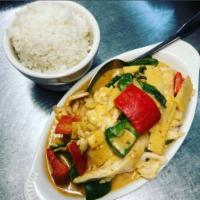 C1. Red Curry · Red curry with bell peppers, bamboo shoots in coconut milk and basil leaves. Spicy.