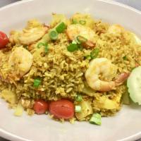 R2. Pineapple Fried Rice Dinner · Pineapple chunks fried in curry powder with rice. Mixed with shrimps, chickens, raisin, egg,...
