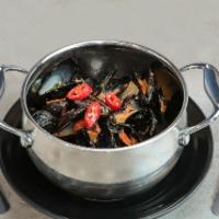 SPICY SEAFOOD TOM YUM  · Crab and shrimp in kalanga root, kaffir lime, mushrooms, carrots, bell peppers spicy chili l...