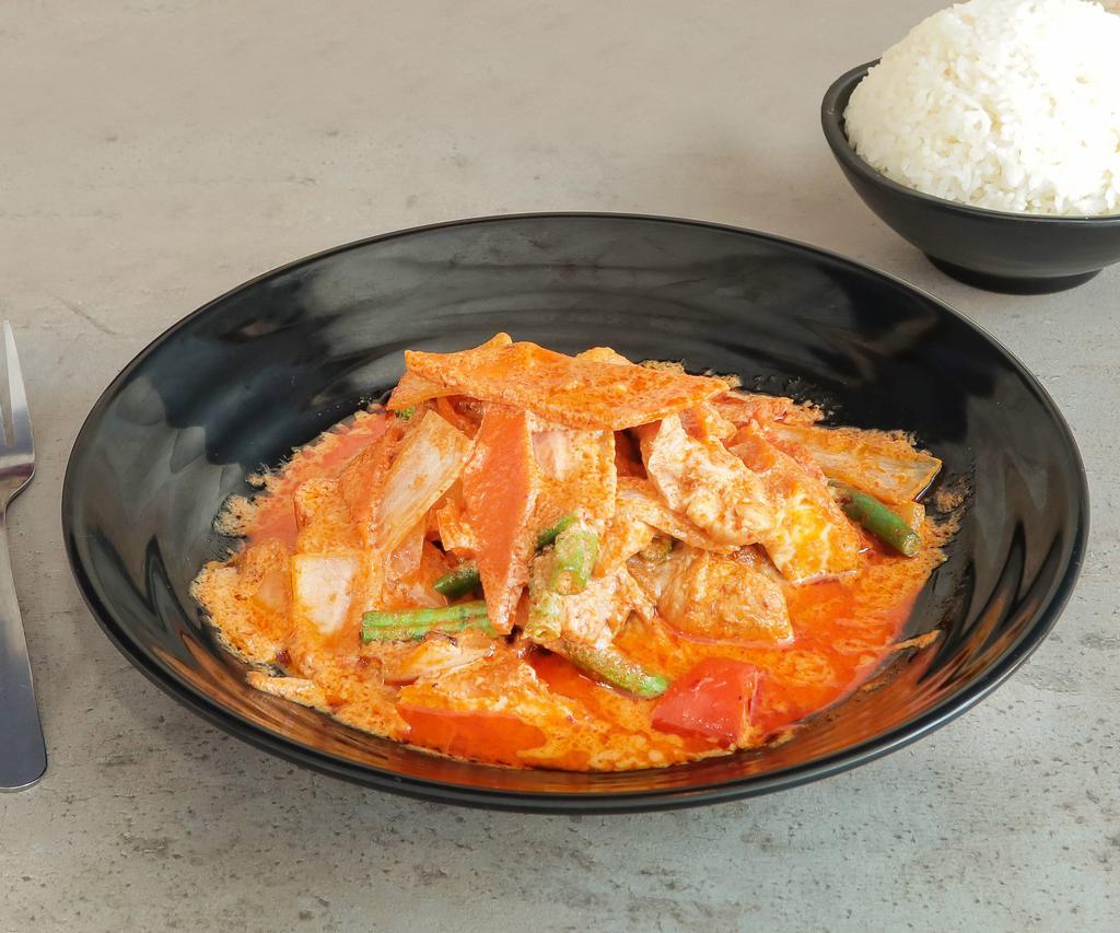 RED CURRY · Onions, bell peppers, basil, carrots and green beans in a coconut broth. Recommended medium spicy.