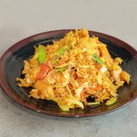 PINEAPPLE FRIED RICE  · Yellow curry base with cashew nuts, snow peas, bell peppers, onions, carrots and beansprouts...