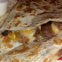 Quesadilla with Meat · 1 giant tortilla with melted cheese.