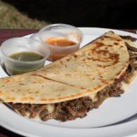 Quesadilla · Large corn or flour tortilla, with mozzarella cheese and your choice of meat.