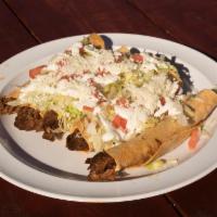 Flautas · 5 deep-fried rolled tortillas filled with your choice of chicken or barbacoa.