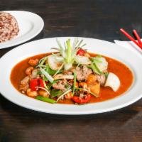 Cashew Nut Sauce · Stir-fried with cashew nuts, pineapple, bell pepper, onion, scallion, snow peas and sweet ch...