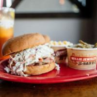 Slawpy Pig · Heaping pile of pulled pork topped with coleslaw. Served on a large bun with choice of side.