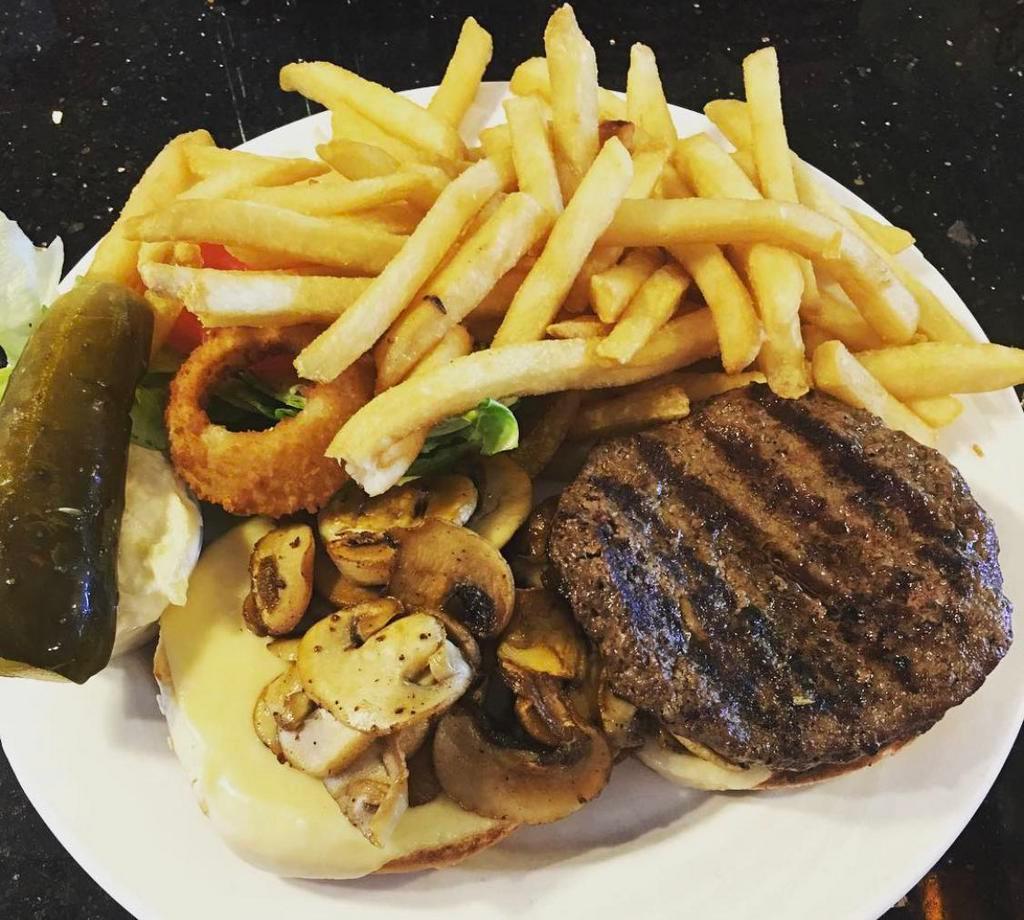 Soho Burger · Served with sauteed mushrooms and melted Swiss cheese.