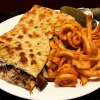 Roast Beef Panini · Sliced roast beef, mozzarella cheese, and special house sauce.